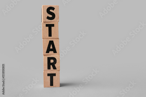 Cubes with word START on gr...