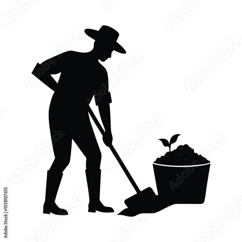 Farmer Silhouette Applying Compost on Organic Farm