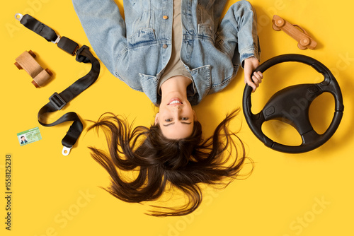 Happy young female driver w...