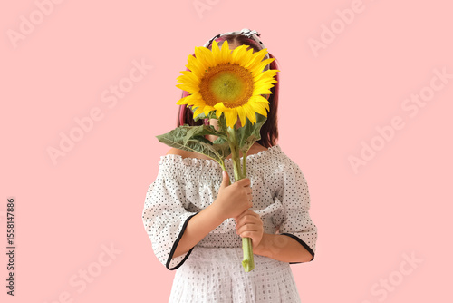 Cute little Asian girl with...