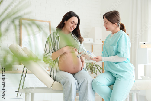 Female doctor with fetal do...