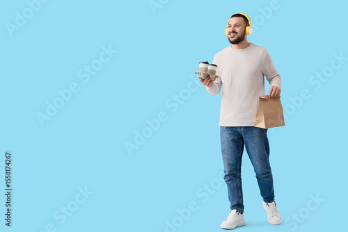 Smiling man with yellow hea...