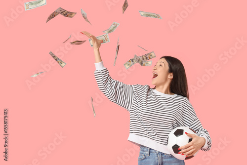 Happy young woman with socc...