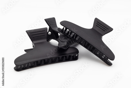 Black claw hair clips isolated
