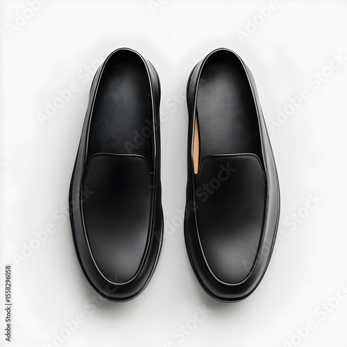 A pair of slip-on shoes with a sleek design, isolated on a clean white background