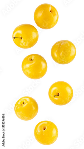 Seven ripe yellow plums falling against a transparent background, perfect for food and beverage projects