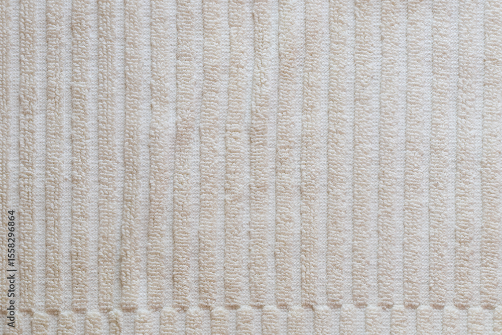 Striped white terry towel as background, shaggy fabric Striped white terry towel as background, shaggy fabric