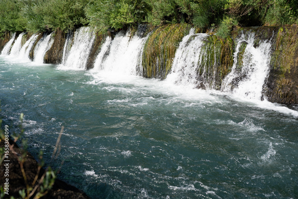 Obraz premium Cascading waterfalls in Bunski Kanal near Blagaj, Bosnia and Herzegowina