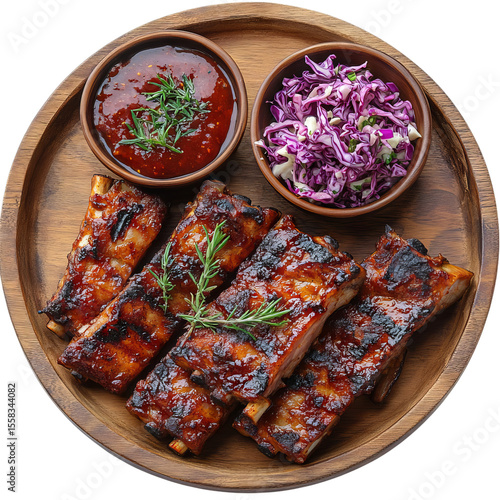 Indulge in Succulent Barbecue Ribs Served with Tangy Sauce and Refreshing Cabbage Salad - A Perfect Culinary Experience for Food Lovers