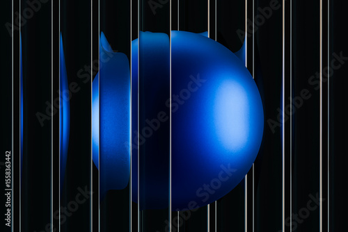 Abstract 3D design featuring a blue fluted glass sphere with reflections