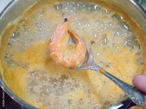 Cooking shrimp at home in a saucepan
