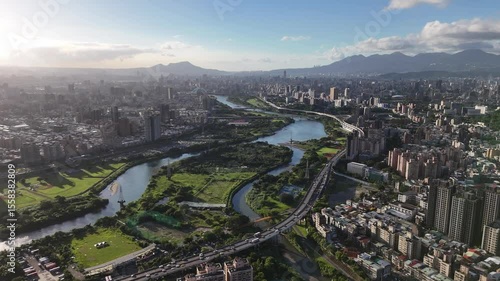 Golden Hour Aerial Riverfront with Highway and Taipei City Skyline