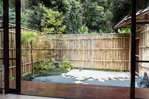 Canvas Print Zen garden bamboo fence stone path green plants peaceful outdoor space t cell ca