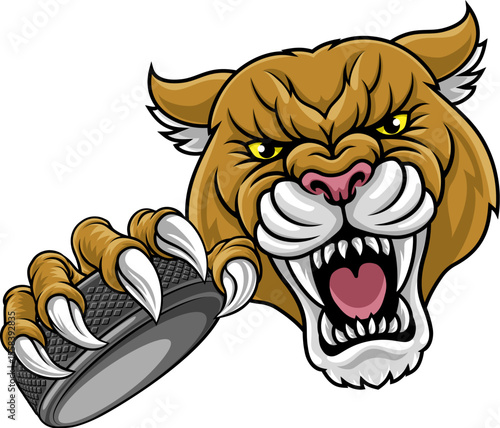Cougar, panther, mountain lion or puma wildcat cat ice hockey sports mascot holding a hockey puck