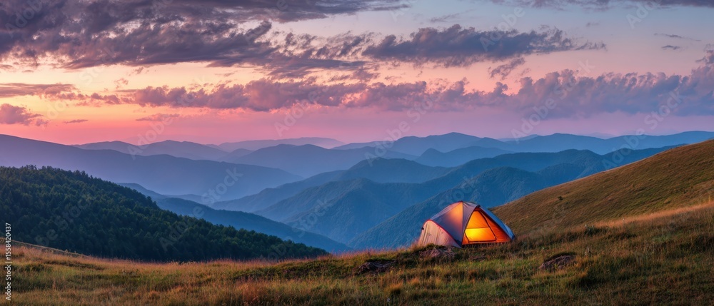 The breathtaking camping scene with a glowing tent against a stunning sunset backdrop. The breathtaking camping scene with a glowing tent against a stunning sunset backdrop.
