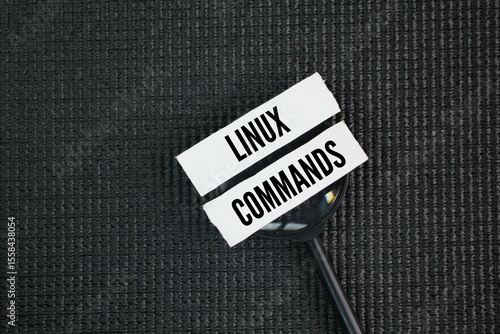 Photography A magnifying glass with the words Linux commands