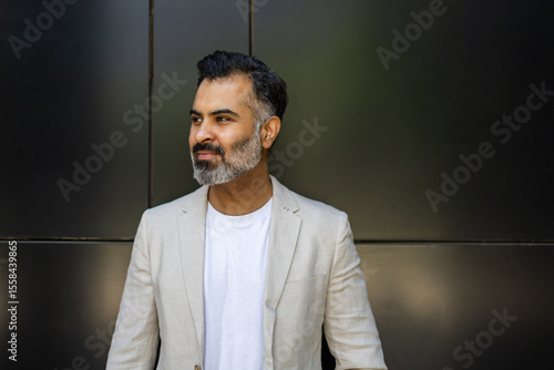 Confident Indian man in stylish summer attire