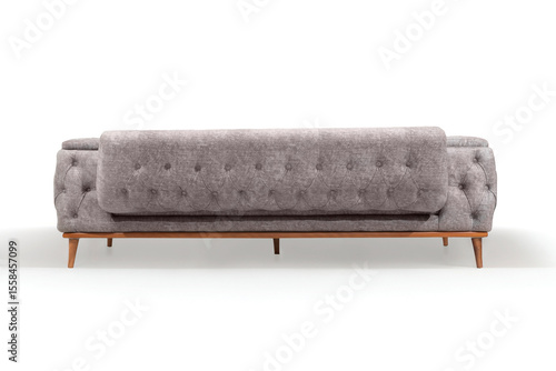 Back view of a gray tufted sofa, showcasing the buttoned upholstery and wooden frame, isolated on a pure white background for versatile use.