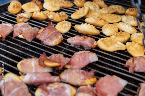 Wallpaper Mural Traditional Polish street food, Oscypek - smoked sheep cheese on a grill, sold at the Christmas market Torontodigital.ca