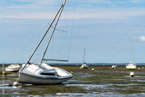 Boats stranded at low tide in Arcachon Bay