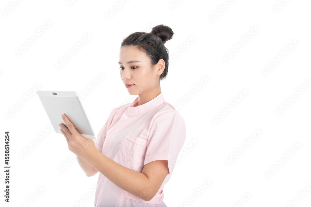 Young Chinese female nurse on white background Young Chinese female nurse on white background