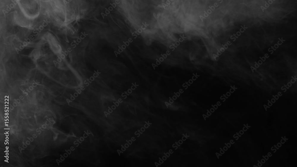 Static shot of dark, wispy fog provides a mysterious texture on a black background. Versatile moody overlay for cinematic projects