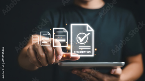 Person registering documents through digital tablet, showcasing online application and digital transformation, emphasizing the registration process.