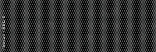 Metal speaker mesh seamless bg with black backdrop. Chrome perforated metal background on black. Honeycomb doles on aluminum sheet. Vector illustration