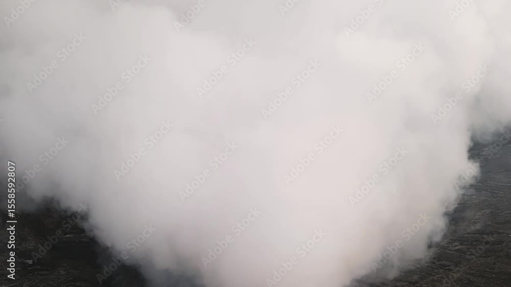 Volcano crater steaming timelapse Bromo Indonesia active somma caldera volcanic terrain Volcano crater steaming timelapse Bromo Indonesia active somma caldera volcanic terrain