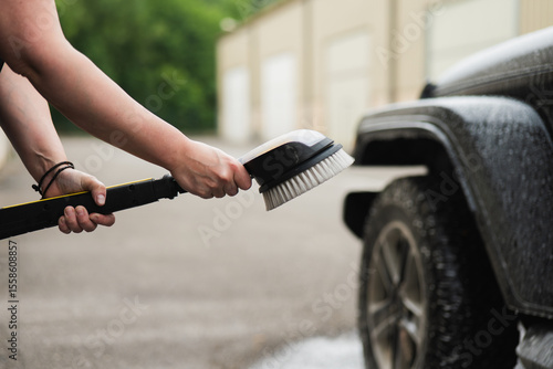Car wash with brush tool for thorough cleaning