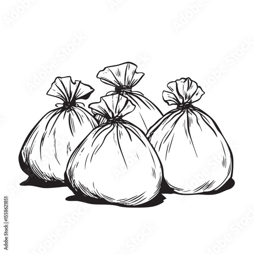 Garbage bags piled together for waste disposal in an urban setting