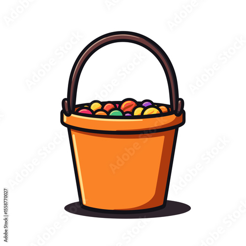 Orange Halloween candy bucket with assorted treats, festive holiday celebration