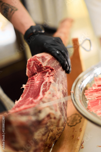 Photography Close-up of Slicing Jamón Serrano