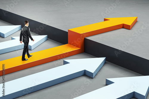 Businessman walking on upward orange arrow breaking through barrier toward success on gray background, symbolizing growth and leadership.