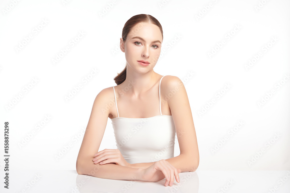 A beautiful young woman with clean, fresh skin against a white background. Skincare, facial treatment, cosmetology, beauty, and spa. An elegant portrait of an woman. A beautiful young woman with clean, fresh skin against a white background. Skincare, facial treatment, cosmetology, beauty, and spa. An elegant portrait of an woman.