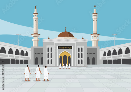 Muslim pilgrims in Ihram walking towards a grand mosque in Mecca, Saudi Arabia.