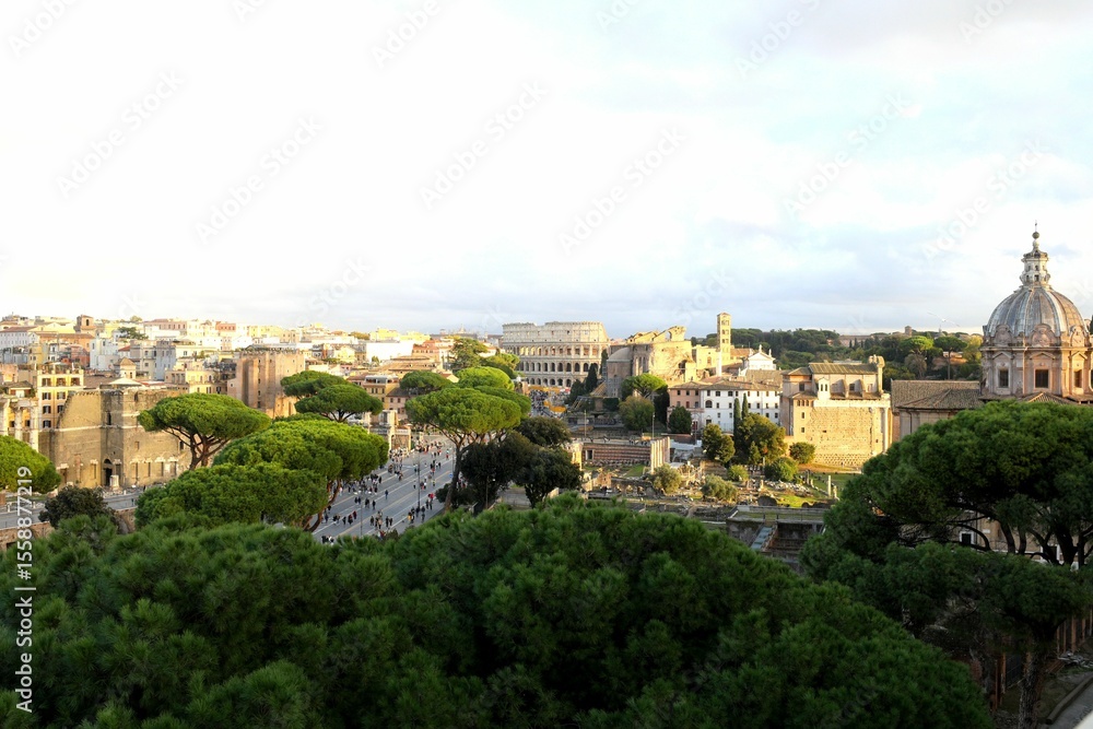 Fototapeta premium Via dei Fori Imperiali Leading to the Colosseum at Sunset, Rome at sunset