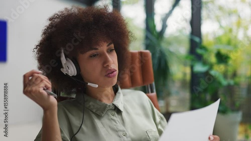 Woman tech support agent rolling her eyes while talking on phone, poor service