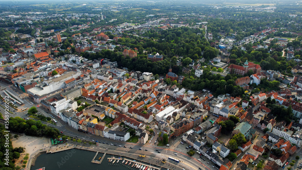 Fototapeta premium Aerial view of the old town of the city Flensburg in Germany on an overcast day in afternoon