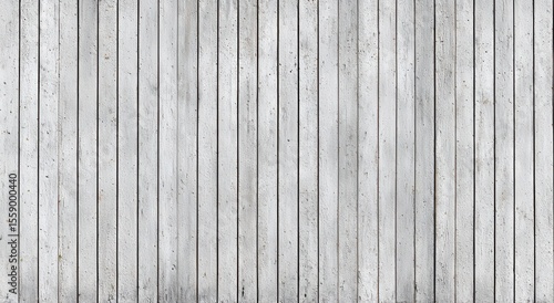 Weathered, light gray vertical planks, showing texture and slight discoloration