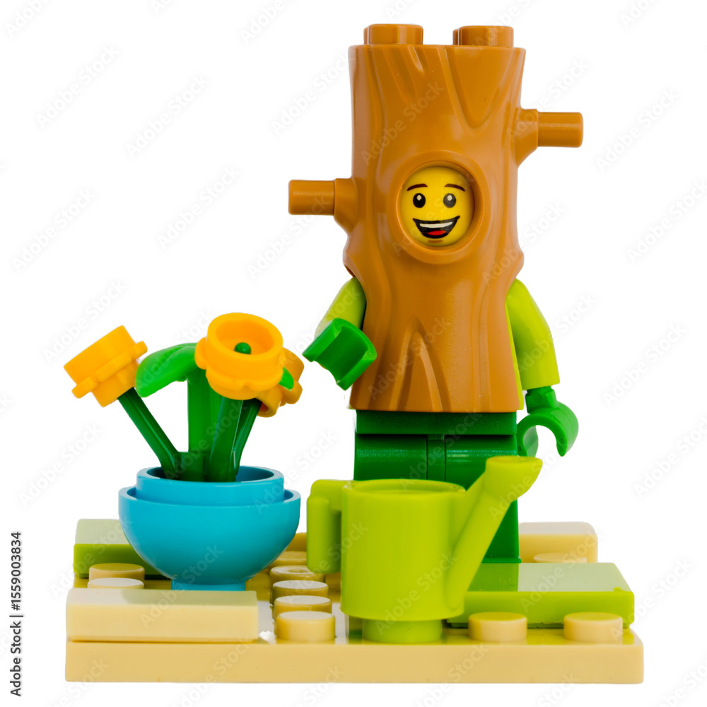 Obraz premium Dortmund - Deutschland 29. Juni 2025 - Lego Szene Baum mit Gießkanne - Studio Aufnahme