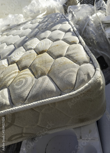 Mattress in the trash