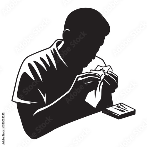 Silhouette of a jeweler examining and cleaning a ring in a professional studio