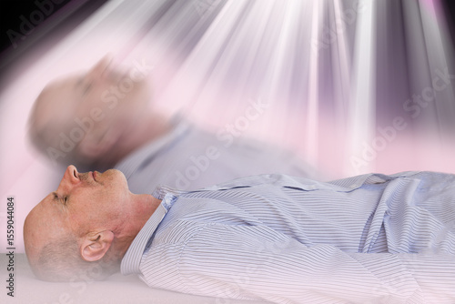 Spirit leaving man  body. Death and afterlife concept