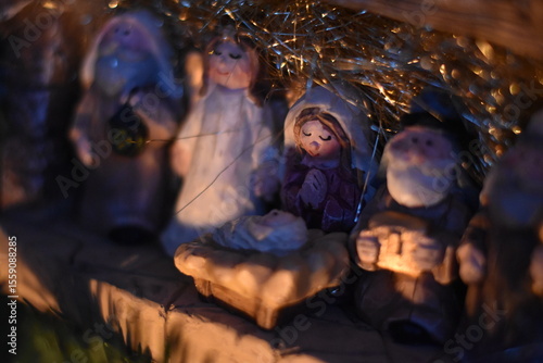Holy Family Figurines in Warm Candlelight