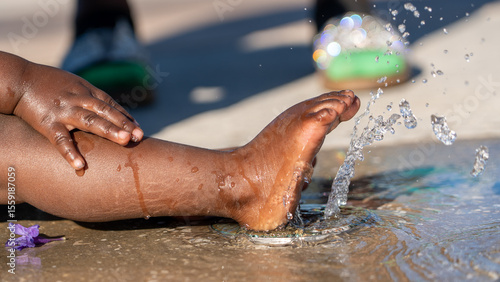 Photography Water provides cool relief from the summer heat as it rushes past the toes