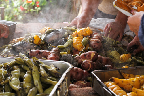 photography of traditional Peruvian food called Pachamanca. Food concept.