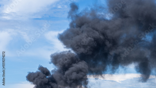 Intense Smoke Rising from Fire