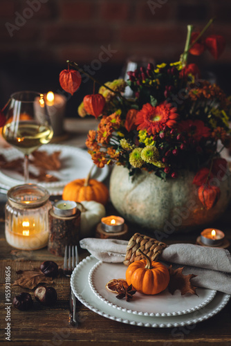 Photography Elegant atmospheric beautiful dinner table setting for thanksgiving or wedding celebration, fall countryside style, pumpkins as decor