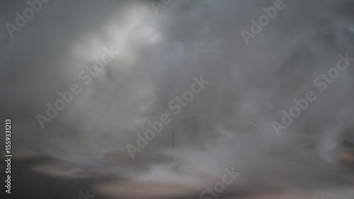 two wedding rings in smoke